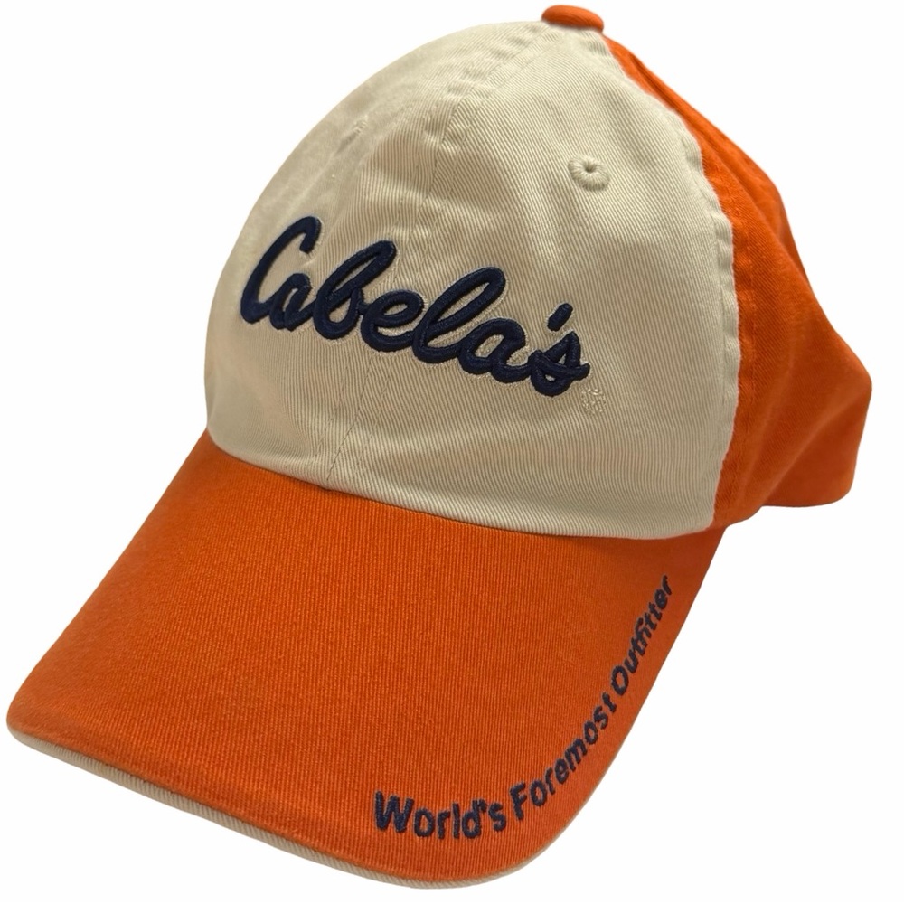Cabela's  Cap in Orange and Cream
Embroidered Cabela’s in blue. 
Velcro closer